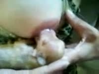 Slut breastfeeding a puppy dog with her big tits